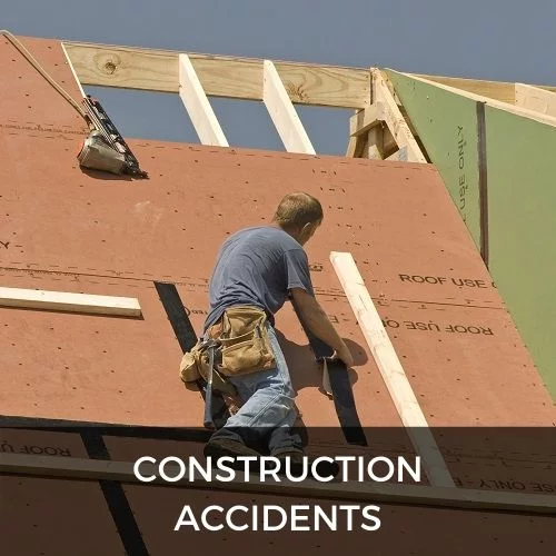 workers building a roof on construction site